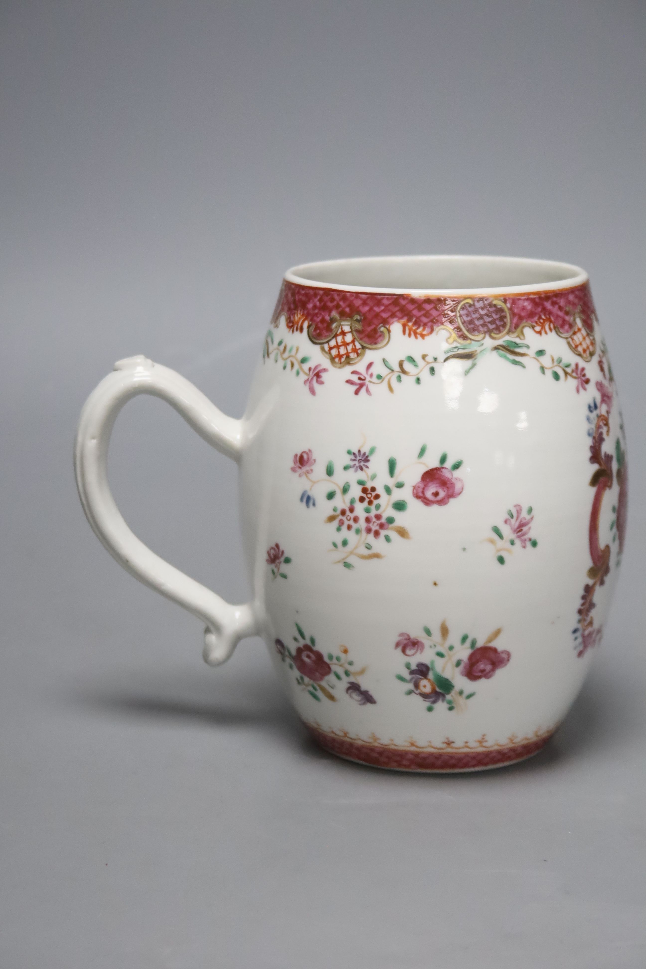 A large 18th century Chinese famille rose tankard, height 14.5cm